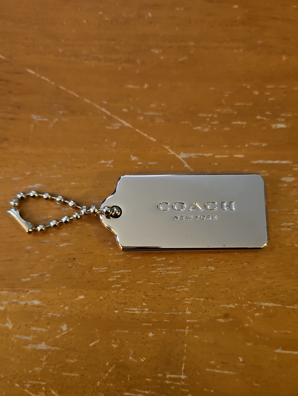 Coach Gold-Tone Hang Tag Keychain
